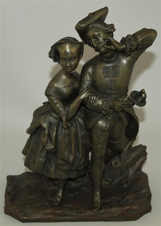 A late 19th century patinated figural bronze modelled as a soldier and his wife, 9.75ins high